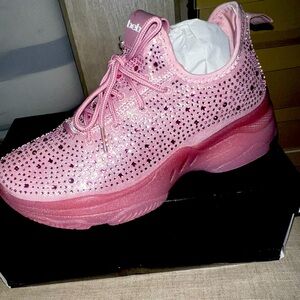 BRAND NEW! Never been worn Bebe sneakers. Stunning barbie pink, size 8M